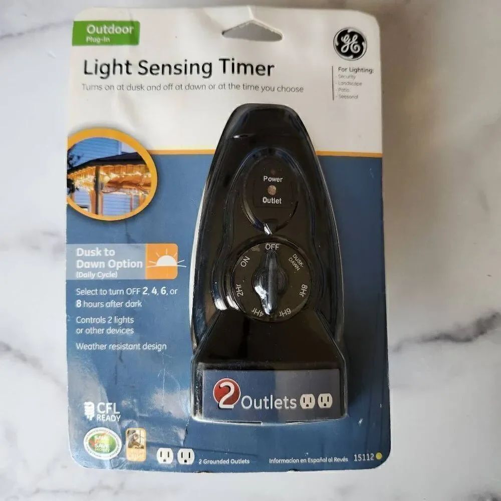 GE light sensing timer outdoor light new in package